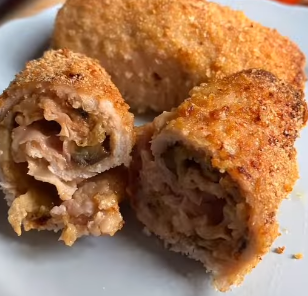 Spiedini di lonza con melanzane e prosciutto